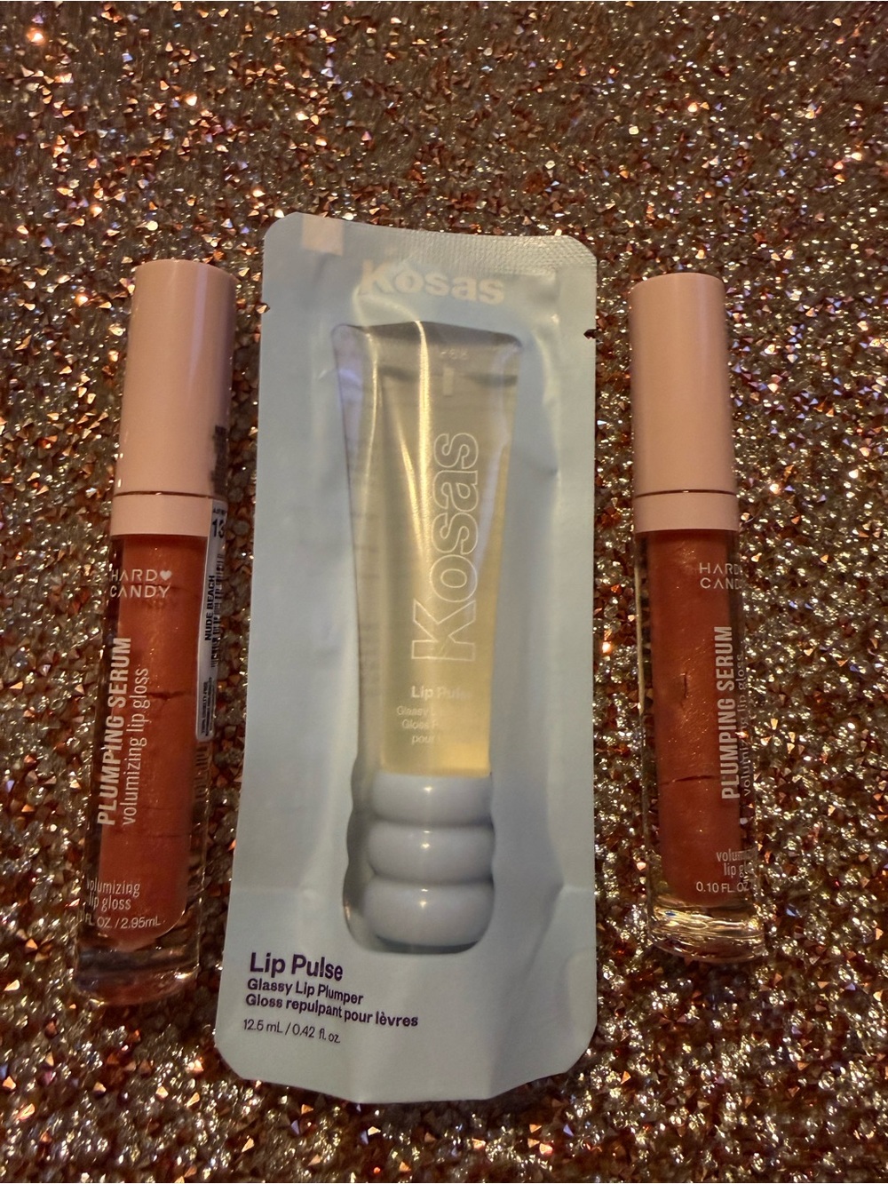 Kosas Lip Pulse glassy lip plumper and 2 plumping serum volumizing lip glosses